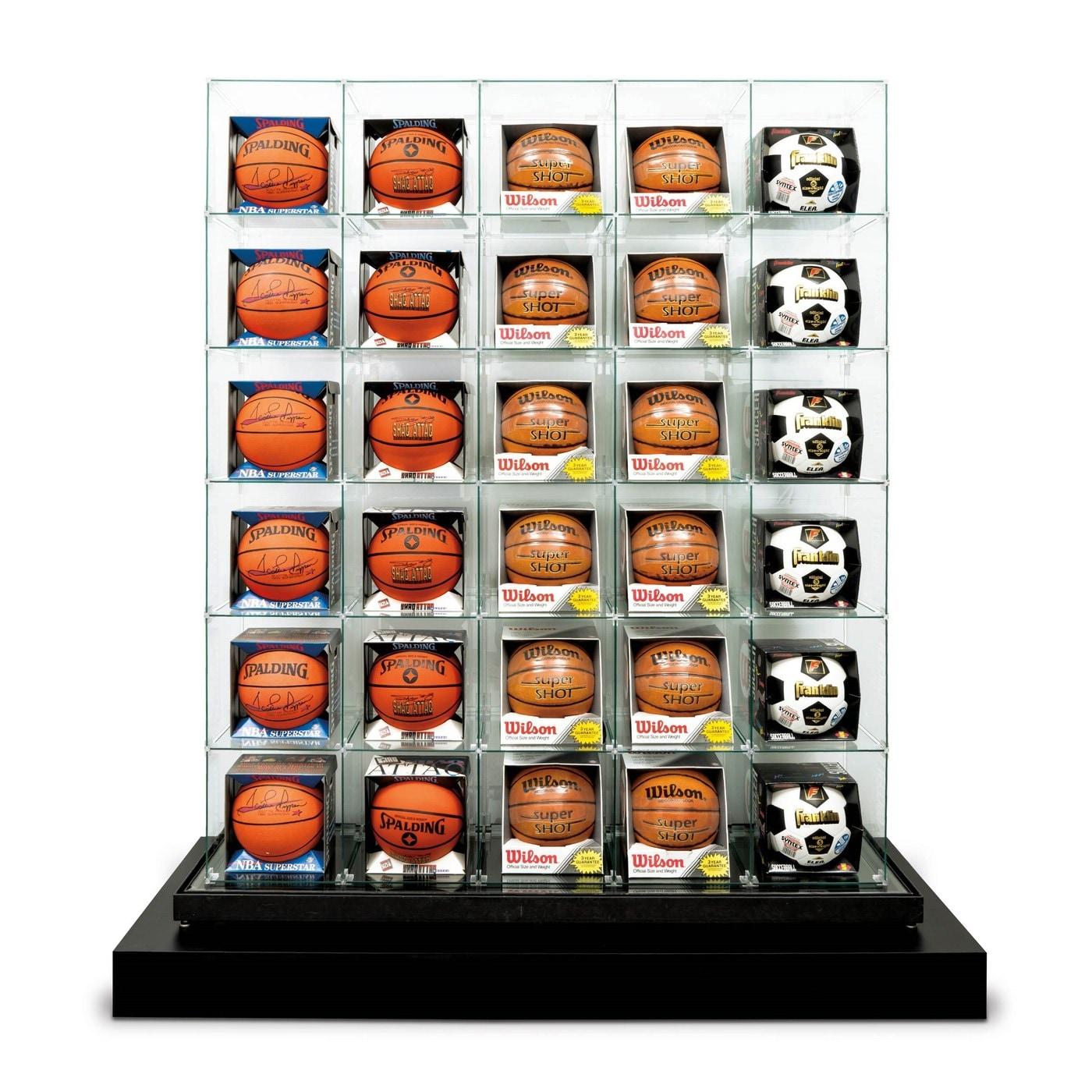 제프 쿤스 Jeff Koons b.1955 American, Encased-Five Rows, basketballs, soccerballs, glass, plastic, steel 171.5&times;44.5&times;203.2&#40;h&#41;cm, 1983-1993, pedestal size: 192&times;65&times;17.5&#40;h&#41;cm, 16~20억원. 케이옥션 제공.