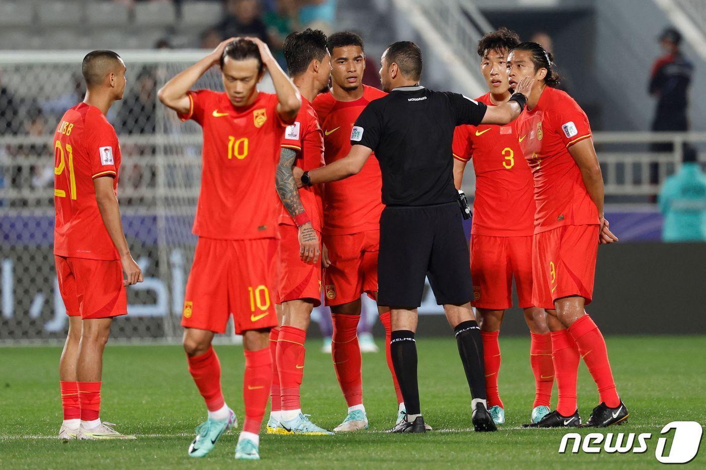 타지키스탄과 득점 업싱 비긴 중국. ⓒ AFP=뉴스1