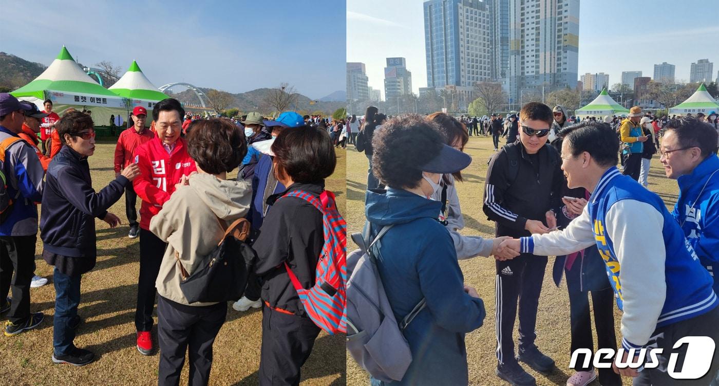 울산 남구을에 출마하는 국민의힘 김기현 후보&#40;왼쪽&#41;와 더불어민주당 박성진 후보가 31일 울산 태화강 십리대밭 걷기행사장을 찾아 유권자에게 지지를 호소하고 있다.&#40;김기현후보, 박성진후보 캠프 제공&#41;