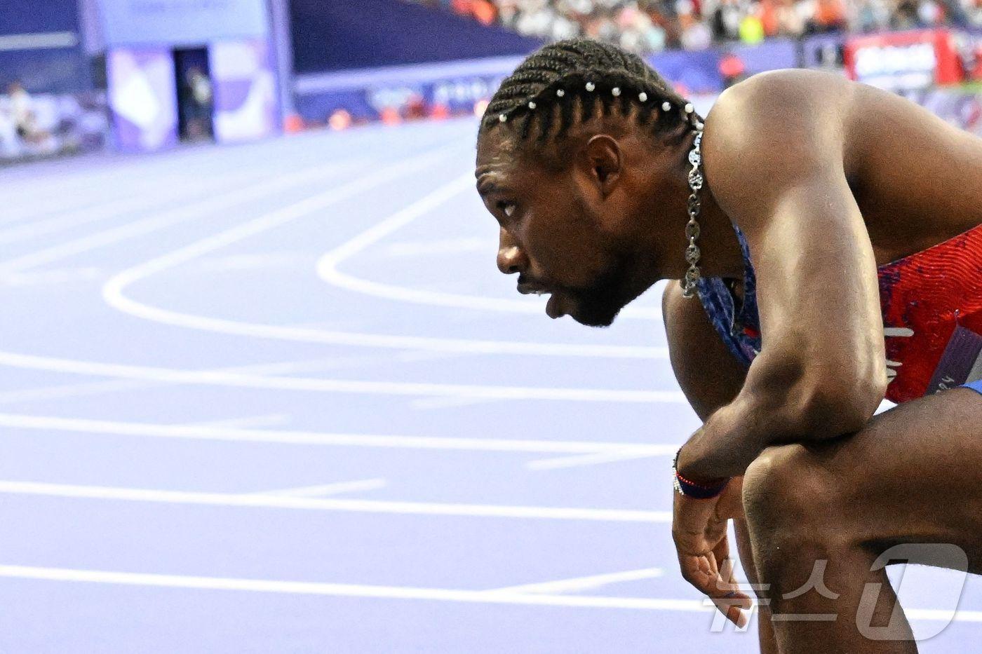 코로나19 확진된 채 육상 200m 경기에 나선 노아 라일스. ⓒ AFP=뉴스1