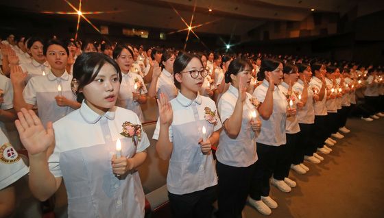 '사랑과 봉사로 헌신'