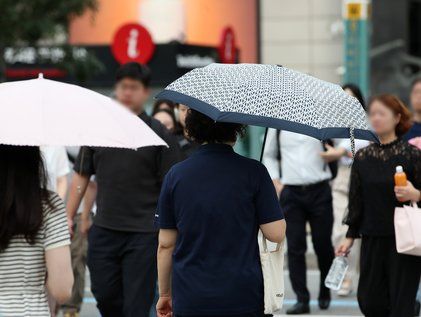 추석 지나도 양산 쓰고